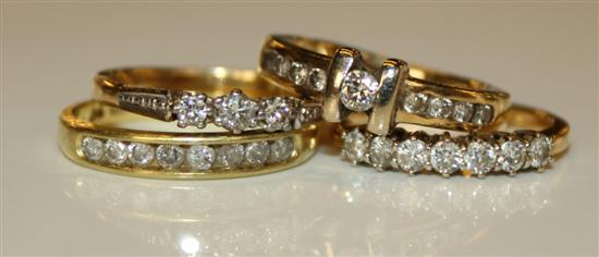 4 x 18ct gold and diamond rings.